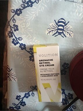 Volition Grenache Retinol Eye Cream — White & Yellow